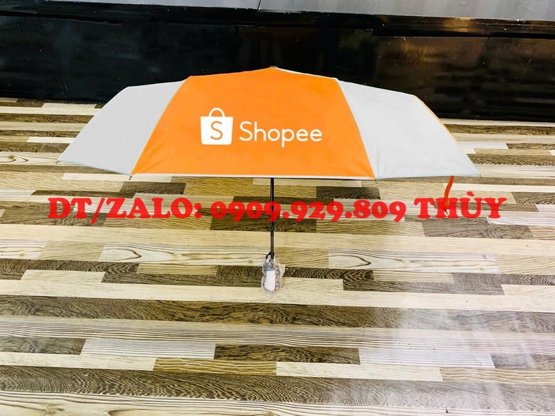 Dù che mưa cầm tay in logo quảng cáo