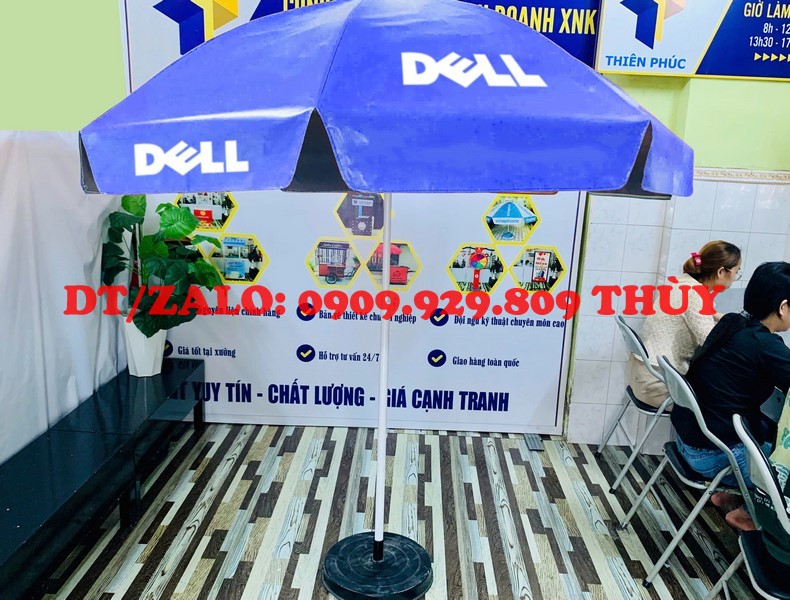 dù che trước cửa hàng in logo điện thoại